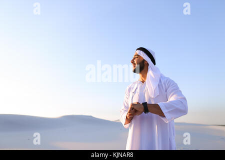 Portrait of handsome Arab businessman who experiencing new iWatc Stock Photo