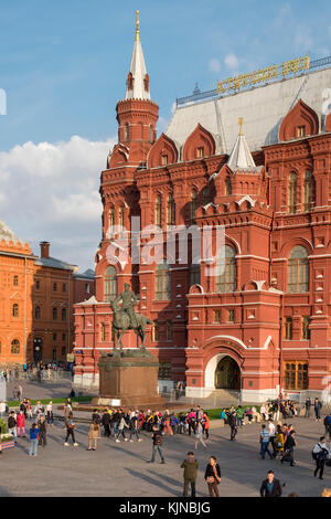 Marshall Zhukov statue outside the exterior facade of The State Historical Museum, Red Square, Moscow, Russia Stock Photo