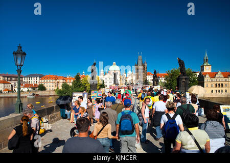 Prague, Czech Republic - June, 2009: Famous Charles Bridge Prague with people crowd in Prague, Czech Republic. Stock Photo