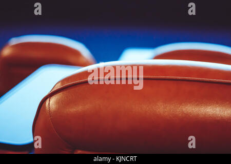 back view of empty red velvet seats in movie theater Stock Photo - Alamy