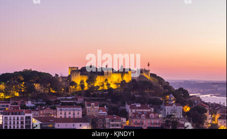 LISBON, PORTUGAL - NOVEMBER 19, 2017: The cityscape of Lisbon, Portugal, by night, shortly after sunset on a November day. Stock Photo
