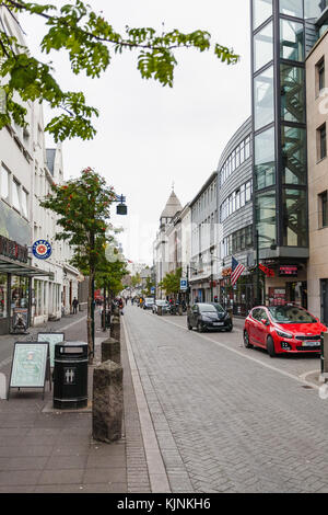 REYKJAVIC, ICELAND - SEPTEMBER 5, 2017: people on Austurstraeti street in Reykjavik city in autumn. Reykjavik is the capital and largest city of Icela Stock Photo