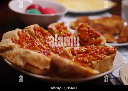 Laid Table with different kinds of foods Stock Photo