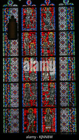 Stained Glass in Wormser Dom in Worms, Germany, depicting various Catholic Saints Stock Photo