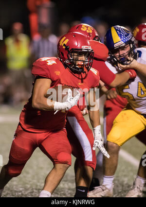 Football action with Sutter vs. Chico High School in Chico, California. Stock Photo