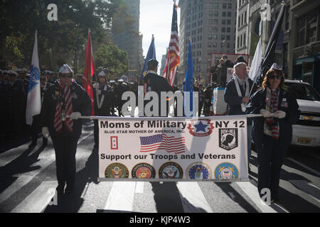 A group from the Moms of Military march in the New York City Veterans Day Parade Nov. 11, 2017. With more than 40,000 participants, the New York City Veterans Day Parade is the largest Veterans Day event in the U.S. U.S. Coast Guard photo by Petty Officer 2nd Class Dustin R. Williams Stock Photo