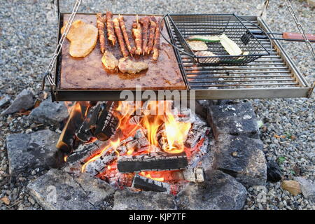 BBQ ribs on open griddle with close up Stock Photo