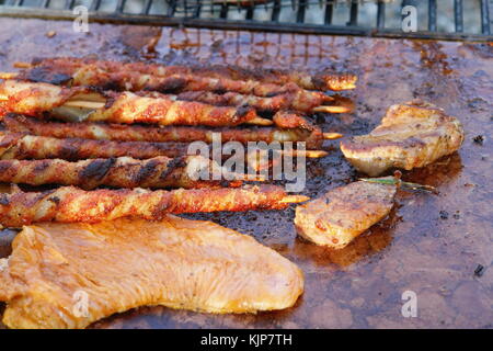 BBQ ribs on open griddle with close up Stock Photo
