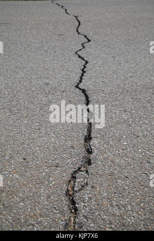 texture of tarmac road with cracks - abstract background Stock Photo