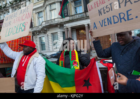 London, UK. 26th Nov, 2017. 26 November, 2017. No Borders, No Slavery Protest. Embassy of Libya, London UK. Following recent videos and reports released on migrant slave auctions in Libya, anti-slavery groups and SOAS Student Union and following along with French intellectuals like Tiken Jah Fakoly, hold a protest outside the Libyan Embassy in London. Organisers claim that despite this evidence the EU and UK continue to work with Libyan authorities to imprison migrants or leave them to drown in international waters. Credit: Steve Parkins/Alamy Live News Credit: Steve Parkins/Alamy Live News Stock Photo