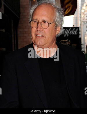 NEW YORK - OCTOBER 07: Actor Chevy Chase and his wife Jayni Luke arrive at their midtown hotel. on October 7, 2009 in New York City.   People:  Chevy Chase, Jayni Luke Stock Photo