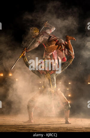 Khon, pantomime performances action of Thailand, a kind of Thai drama, Hanuman Monkey fighting with Giant at Ayutthaya temple at night, performing act Stock Photo