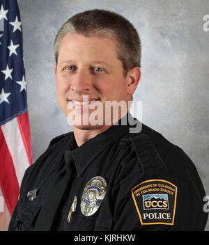 COLORADO SPRINGS, CO - NOVEMBER 27: A police officer (Garrett Swasey, 44) and two civilians died Friday after a man wearing hunting gear and armed with a 'long gun' went on a shooting spree inside a Planned Parenthood clinic. Police detained shooter Robert Lewis Dear at the Planned Parenthood building on November 27, 2015 in Colorado Springs, Colorado.  People:  Garrett Swasey Stock Photo