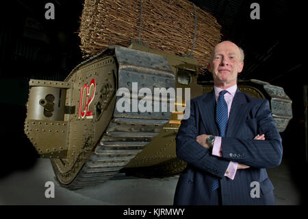 British Mark IV (male) tank (102) with a fascine at The Tank museum and an exact replica (pictured outside) seen with dummy soldiers of the period. Stock Photo