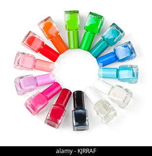 Coloured nail polish bottles stacked circle on a white background.With clipping path Stock Photo