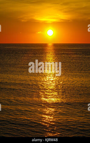 Setting sun over Aegean sea, Kalymnos, Greece Stock Photo