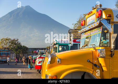 Chicken buses at bus terminal | Antigua | Guatemala Stock Photo