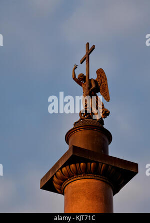 Angel sculpture on the top of Alexander column with sunset illumination in Saint-Petersburg, Russia Stock Photo