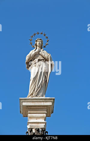 Monument to to the virgin Mary outside the monastery of Jesna Gora the shrine and place of pilgrimage to our lady of Czestochowa Poland with blue sky Stock Photo