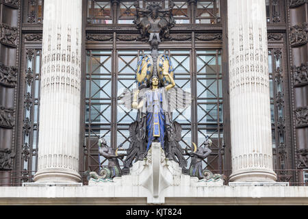 Classic art deco time statue and clock outside the entrance of Selfridge's on Oxford Street in London, UK Stock Photo