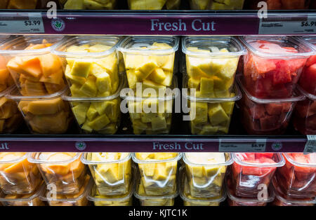 Fresh cut fruit in plastic take away containers a a Whole Foods in New York City Stock Photo