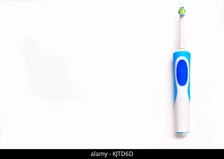 Electric toothbrush isolated on a white background. Oral hygiene Stock Photo