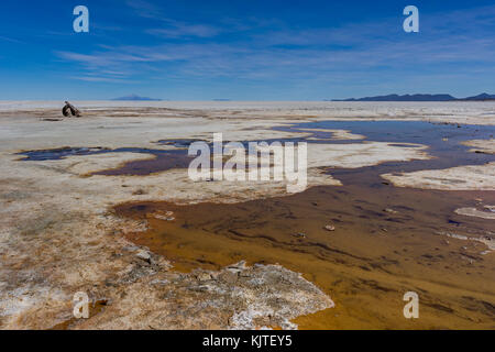 Photo taken in August 2017 in Uyuni Bolivia, South America: Salt Flats in Salar de Uyuni Desert Bolivia. Salar de Uyuni is largest salt flat in the Wo Stock Photo