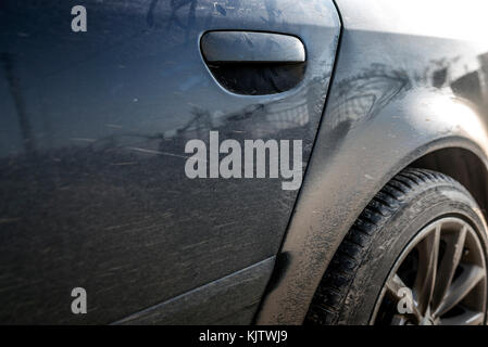 Part of a dirty stained car close up. Stock Photo