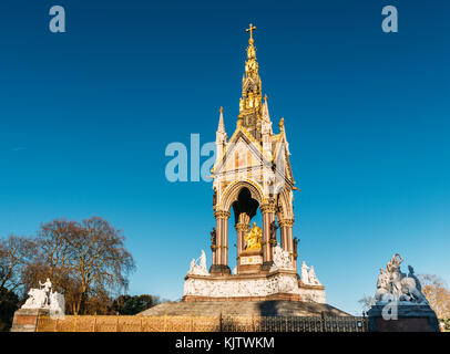 The Albert Memorial is situated in Kensington Gardens, London, directly to the north of the Royal Albert Hall. It was commissioned by Queen Victoria i Stock Photo