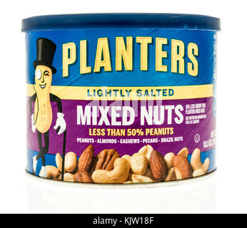 Winneconne, WI - 20 November 2017:  A container of Planters lightly salted mixed nuts on an on an isolated background. Stock Photo