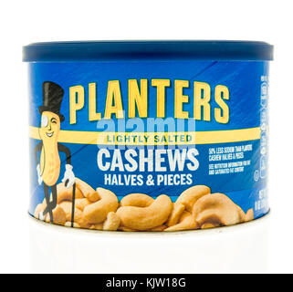 Winneconne, WI - 20 November 2017:  A container of Planters lightly salted cashews on an on an isolated background. Stock Photo