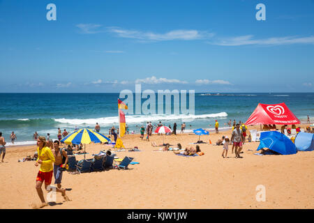 People sunbathing and relaxing on Newport Beach, which is one of Sydney's northern beaches,New South Wales,Australia Stock Photo