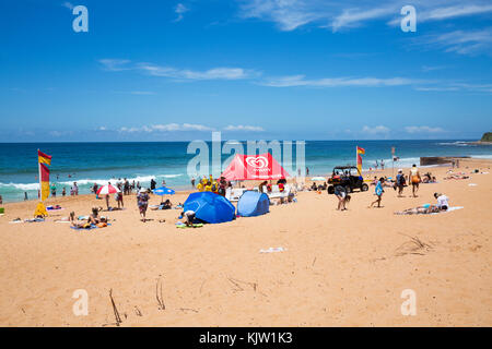People sunbathing and relaxing on Newport Beach, which is one of Sydney's northern beaches,New South Wales,Australia Stock Photo