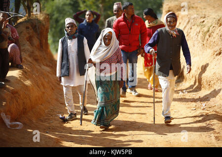 Phidim, Nepal. 26th Nov, 2017. Elderly people return after casting their votes during the first phase of the parliamentary and provincial elections in Phidim Municipality the headquarters of the Panchthar District in the Mechi Zone of eastern Nepal some 600 km from the Capital on Sunday, November 26, 2017. Credit: Skanda Gautam/ZUMA Wire/Alamy Live News Stock Photo