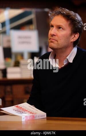 Hay Festival Winter Weekend - Nov 2017  - Journalist and author Luke Harding signs copies of his new book  - Collusion - How Russia Helped Trump Win The White House  - Credit: Steven May/Alamy Live News Stock Photo