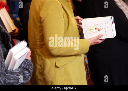 Hay Festival Winter Weekend - Nov 2017  - Customers in the Hay Festival bookshop queue to get their copies of The Orchid Hunter by Leif Bersweden - Credit: Steven May/Alamy Live News Stock Photo