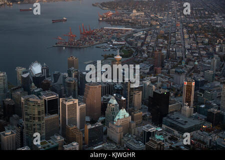 Downtown Vancouver, British Columbia, Canada - Oct 22, 2017 - Aerial view of the city and buildings during sunset. Stock Photo