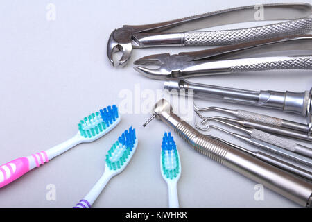 dental care toothbrush with dentist tools isolated on white background. Selective focus. Stock Photo