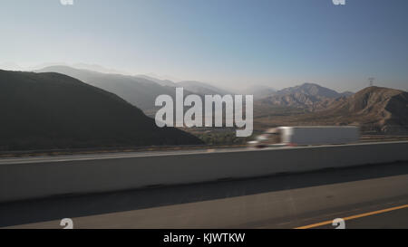 side view from moving car of mountains near Los Angeles Stock Photo