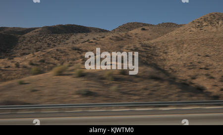 side view from moving car of mountains near Los Angeles Stock Photo