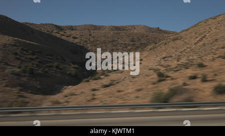 side view from moving car of mountains near Los Angeles Stock Photo