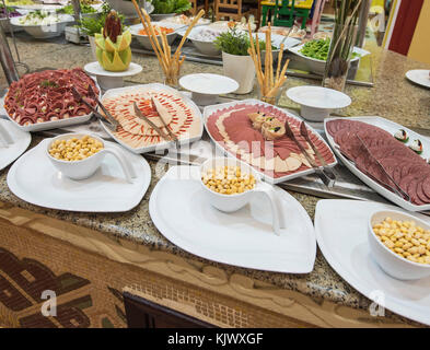 Selection display of cold meat salad food at a luxury restaurant buffet bar area Stock Photo