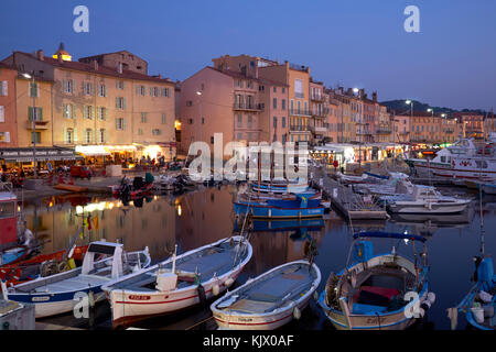 Saint St Tropez harbour, port, at dusk, Riviera, Cote d'Azur, South of France Stock Photo