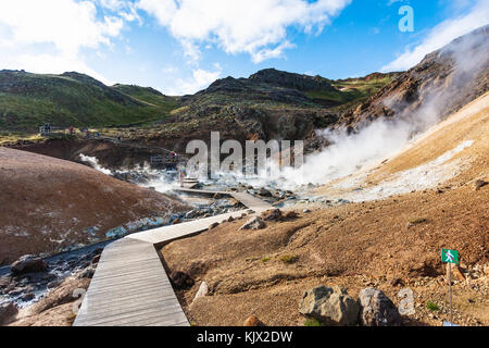 travel to Iceland - wooden pathway in geothermal Krysuvik area on Southern Peninsula (Reykjanesskagi, Reykjanes Peninsula) in september Stock Photo