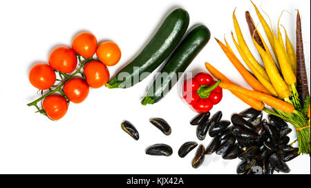 Vegetables. Fresh tomatos. Colorful vegetables background. Healthy vegetable studio photo. Assortment of fresh vegetables close up. Stock Photo