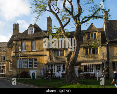 Independent shops in attractive historic High Street of small market town Chipping Camden Cotswolds Gloucestershire England UK Stock Photo