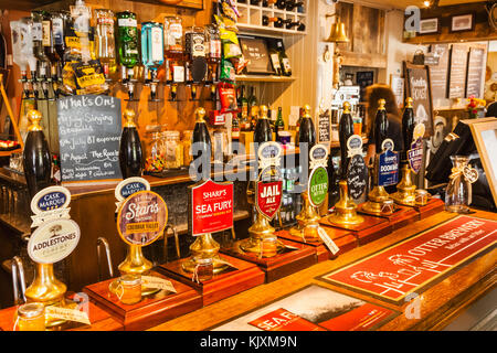 England, Cornwall, Pub Beer Pump Handles Stock Photo