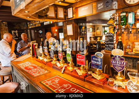 England, Cornwall, Pub Beer Pump Handles Stock Photo