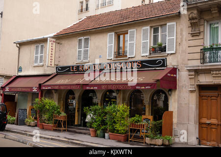 Brasserie restaurant in Paris in the old building with apartment on the first floor Stock Photo