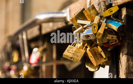 Padlocks from unknown lovers attached to Ponte dell'Accademia in Venice on September 13, 2017. Stock Photo